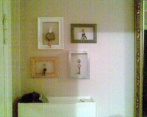 Keys are now hung on hooks within the frames. It's less messy - especially when the frames aren't crooked:)